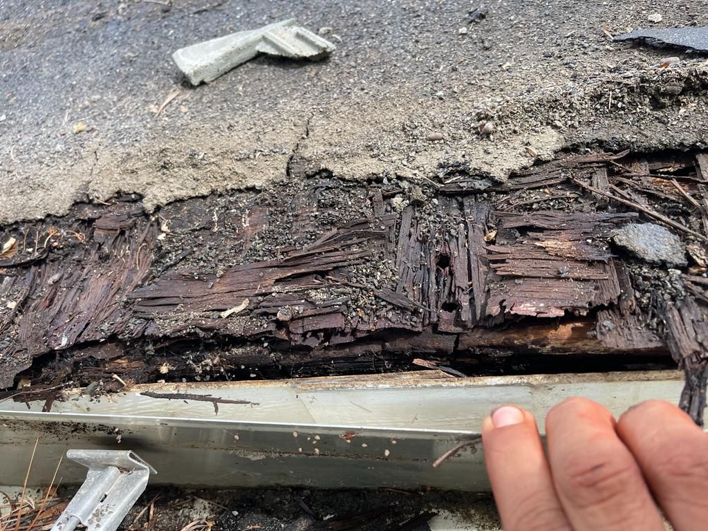 Deteriorated roof decking exposed during repairs, Gold Coast Roofing and Solar