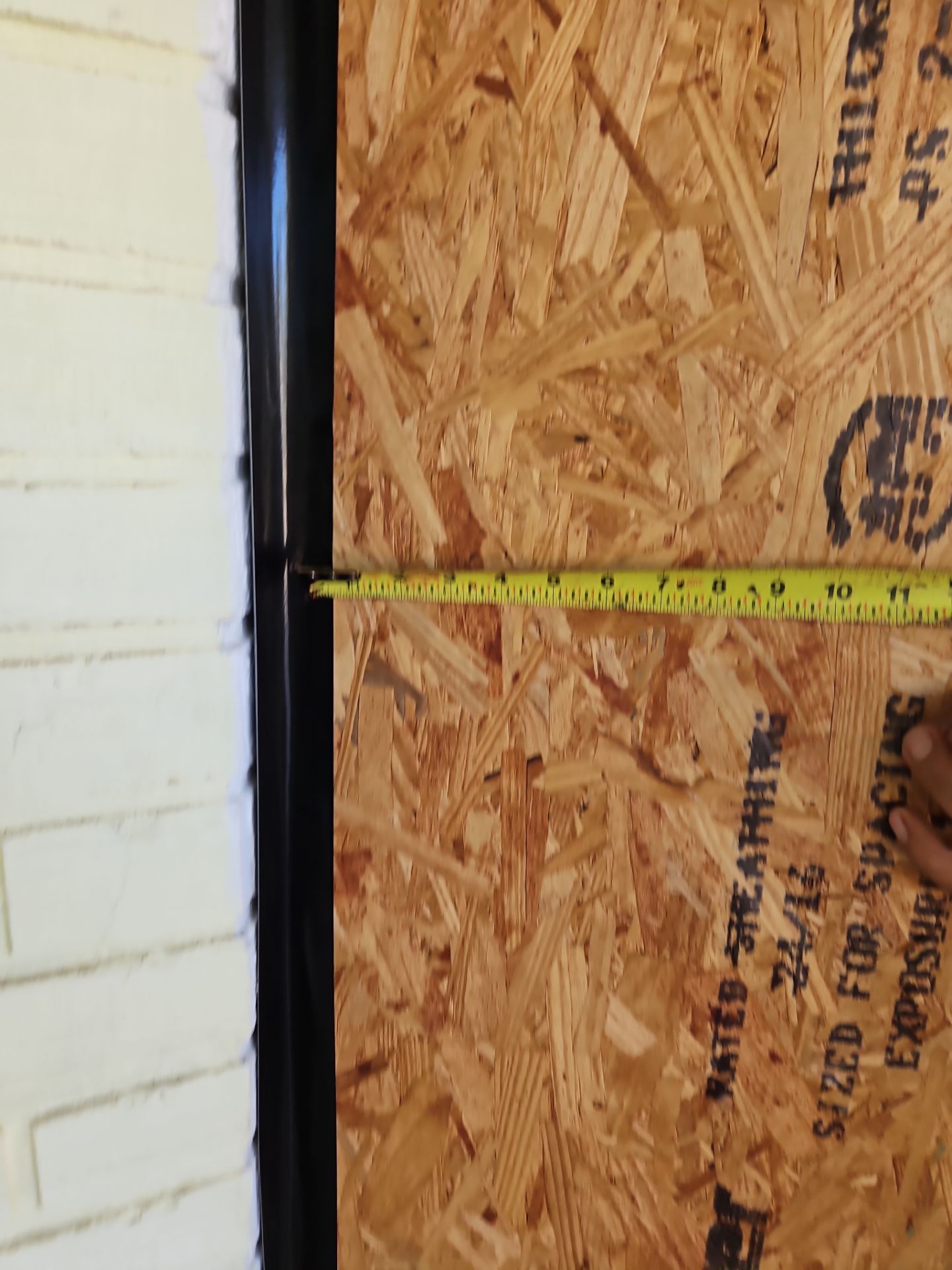 Measuring a boarded window opening for repairs