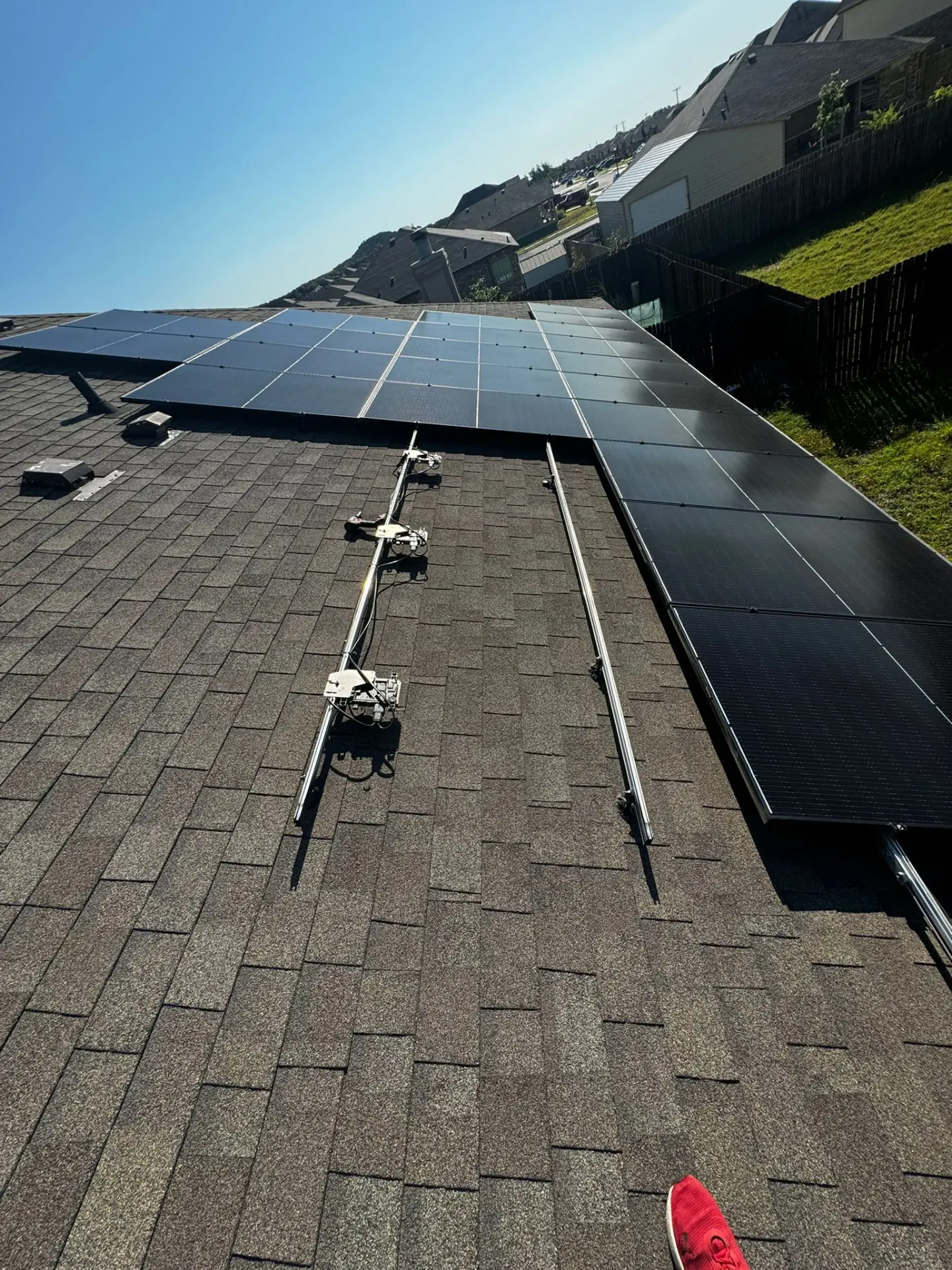 Residential rooftop solar array installed by Gold Coast on a shingle roof