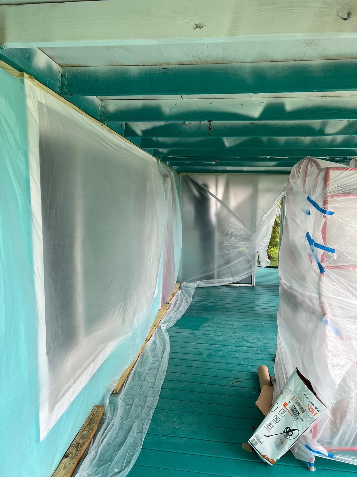 Exterior ceiling restoration with protective sheeting, Gold Coast Roofing and Solar