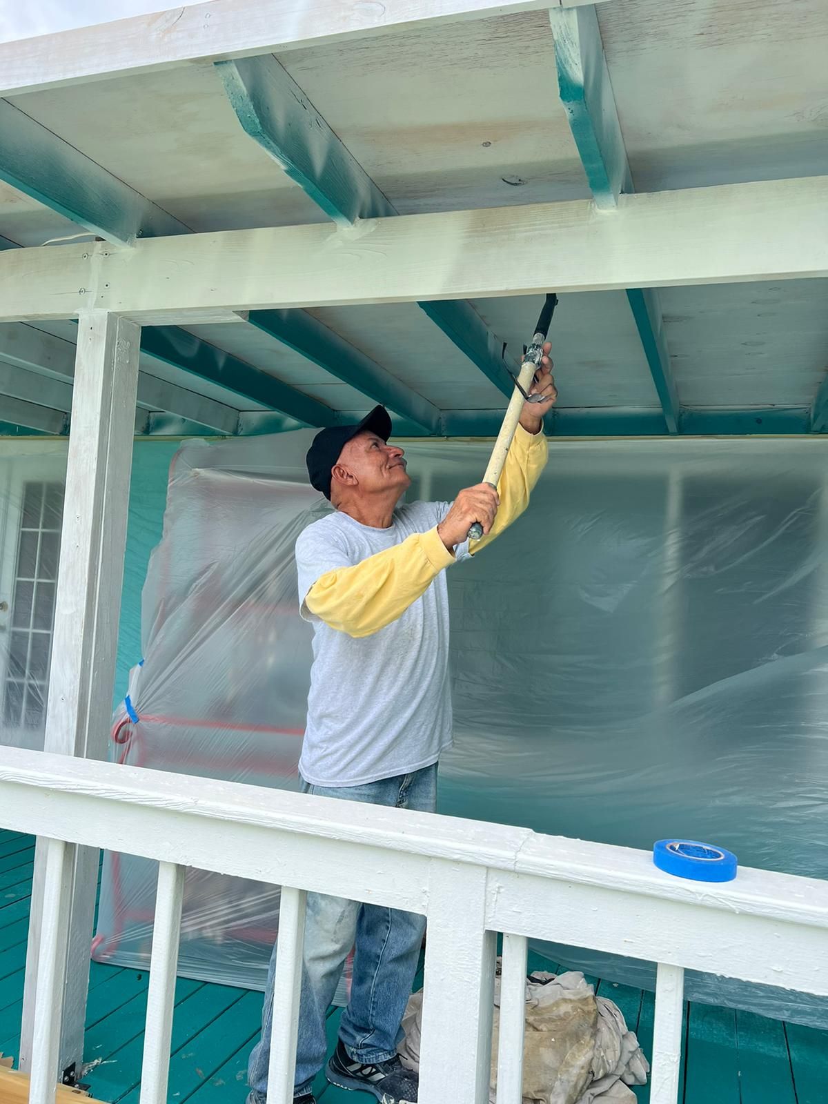 Crew member performing related ceiling restoration, Gold Coast Roofing and Solar