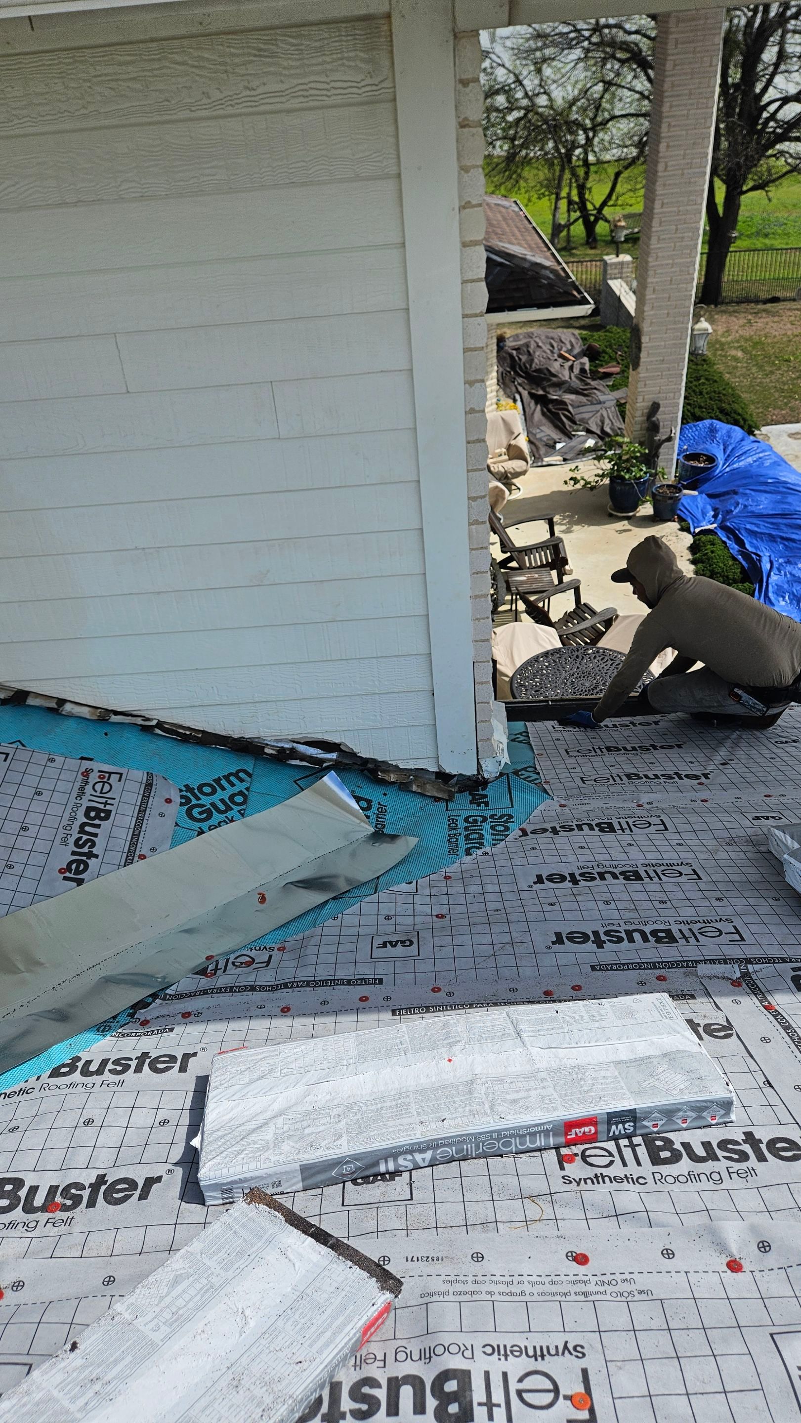 Roof repair detail beside an exterior wall, Gold Coast Roofing and Solar