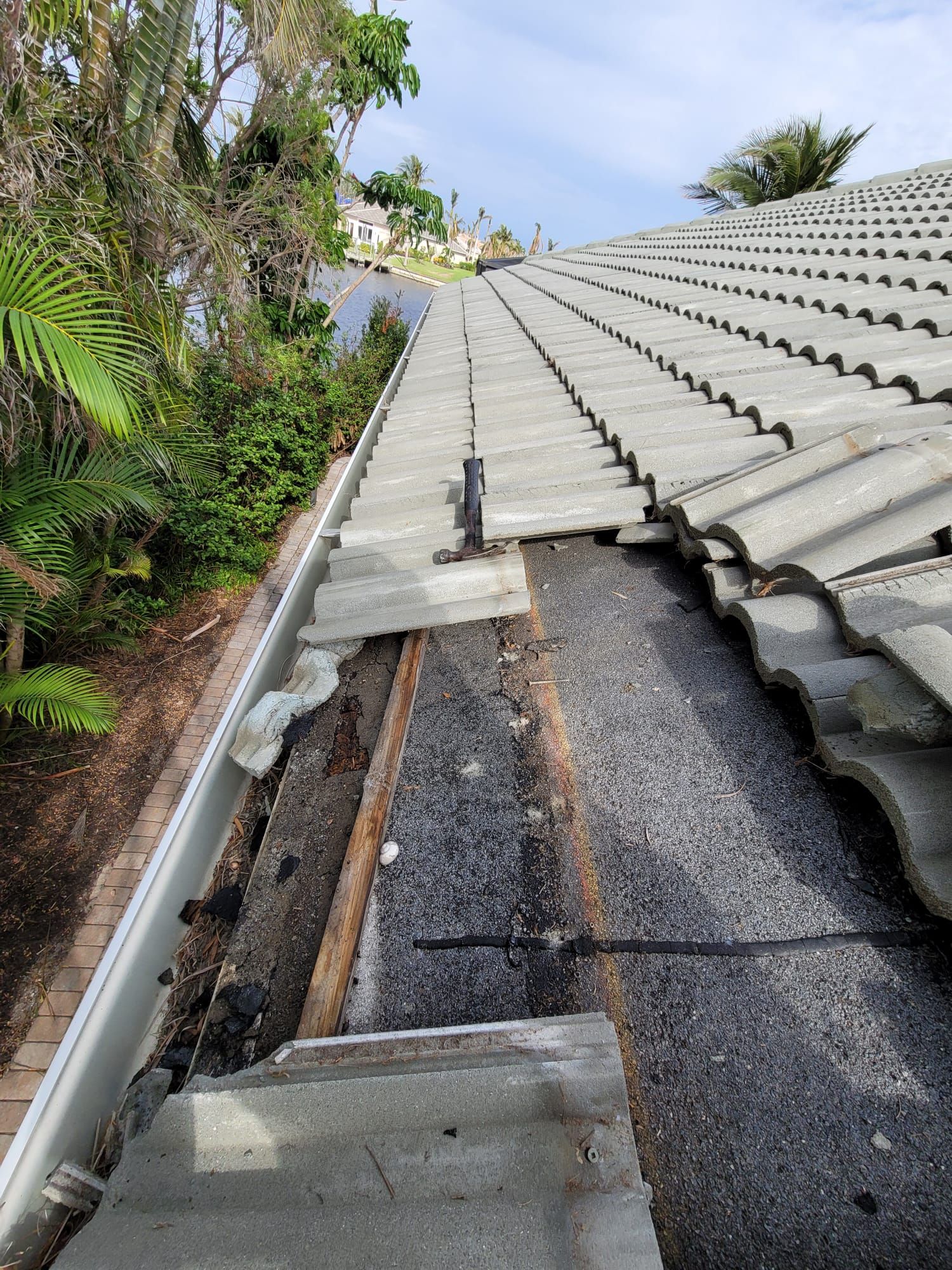 Tile roof edge opened for repairs, Gold Coast Roofing and Solar