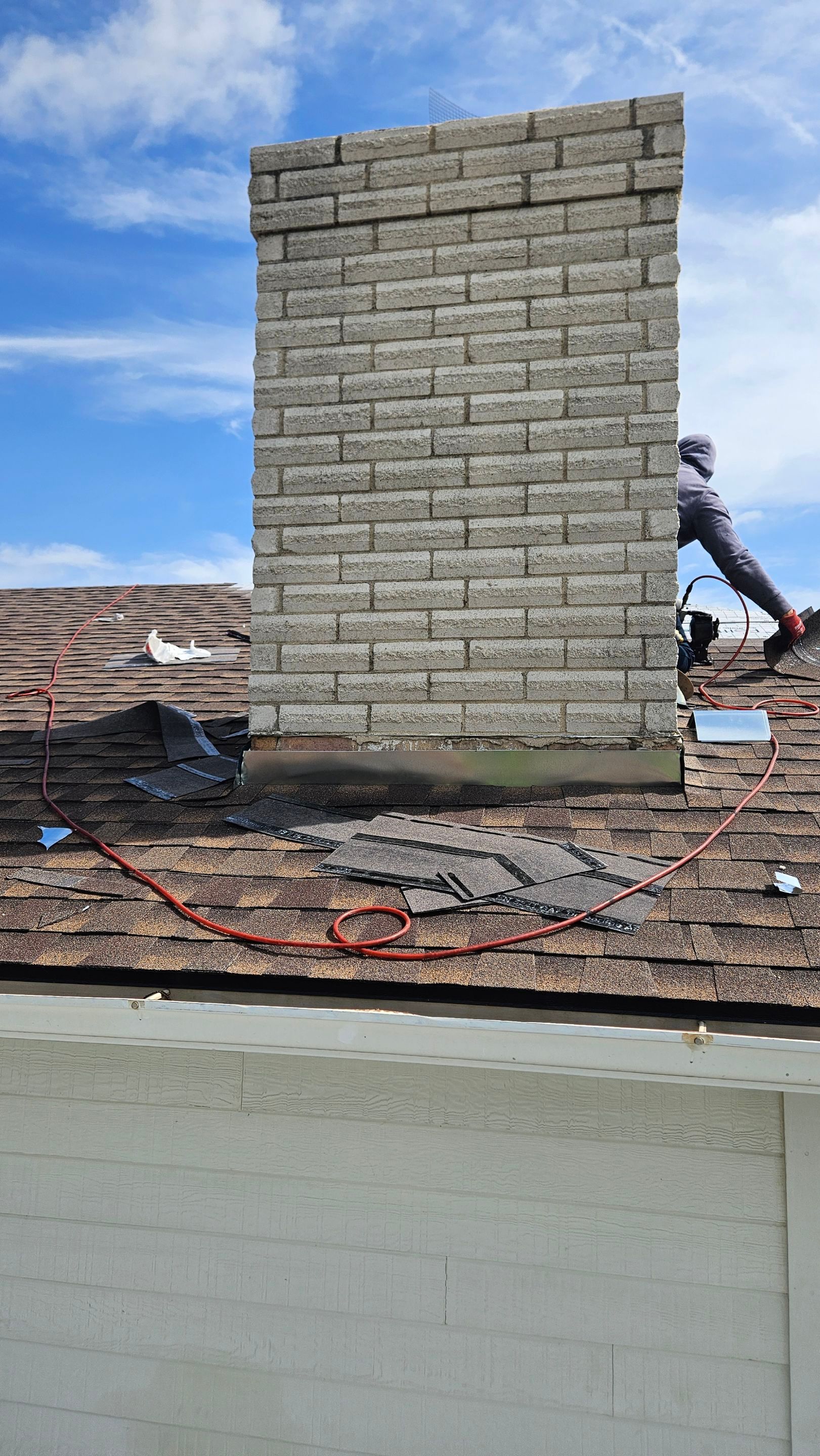 Completed chimney flashing on a shingle roof, Gold Coast Roofing and Solar