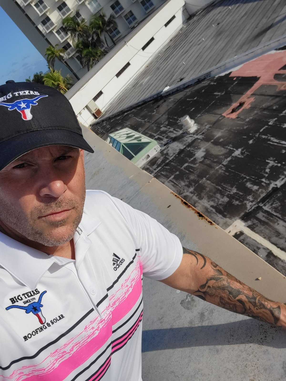 Gold Coast owner on site documenting roof conditions, Atlantis Bahamas