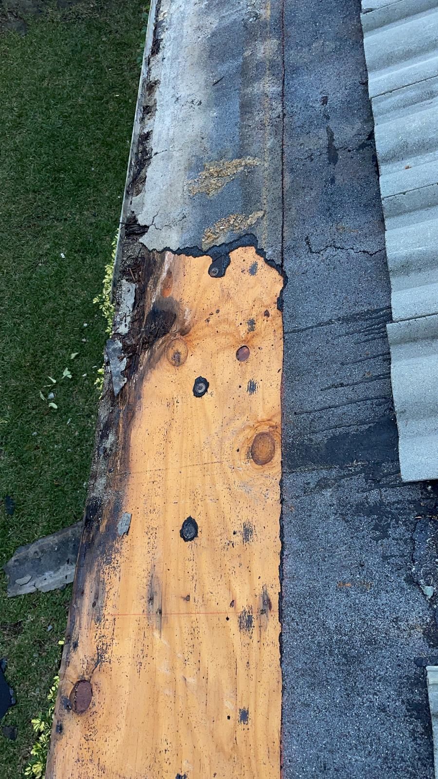 Damaged decking at the roof edge, Gold Coast Roofing and Solar