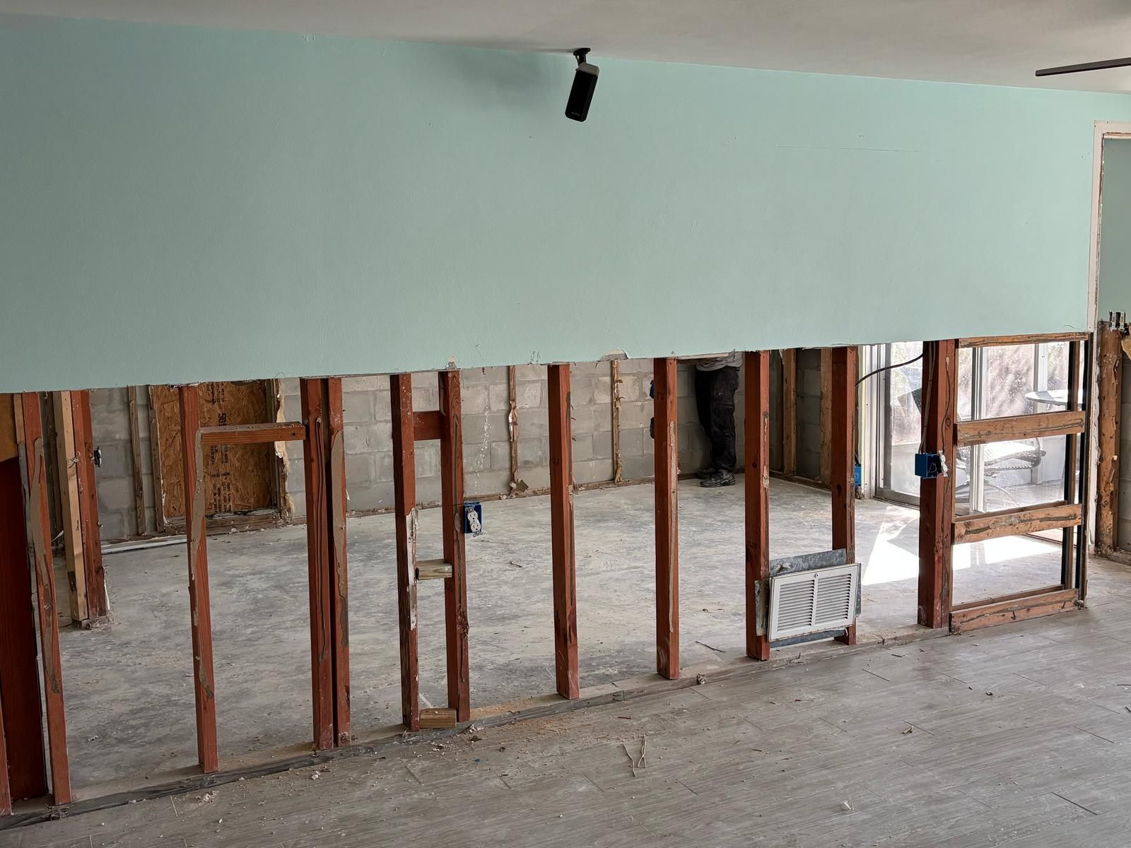 Exposed wall framing after removal of flood damaged materials