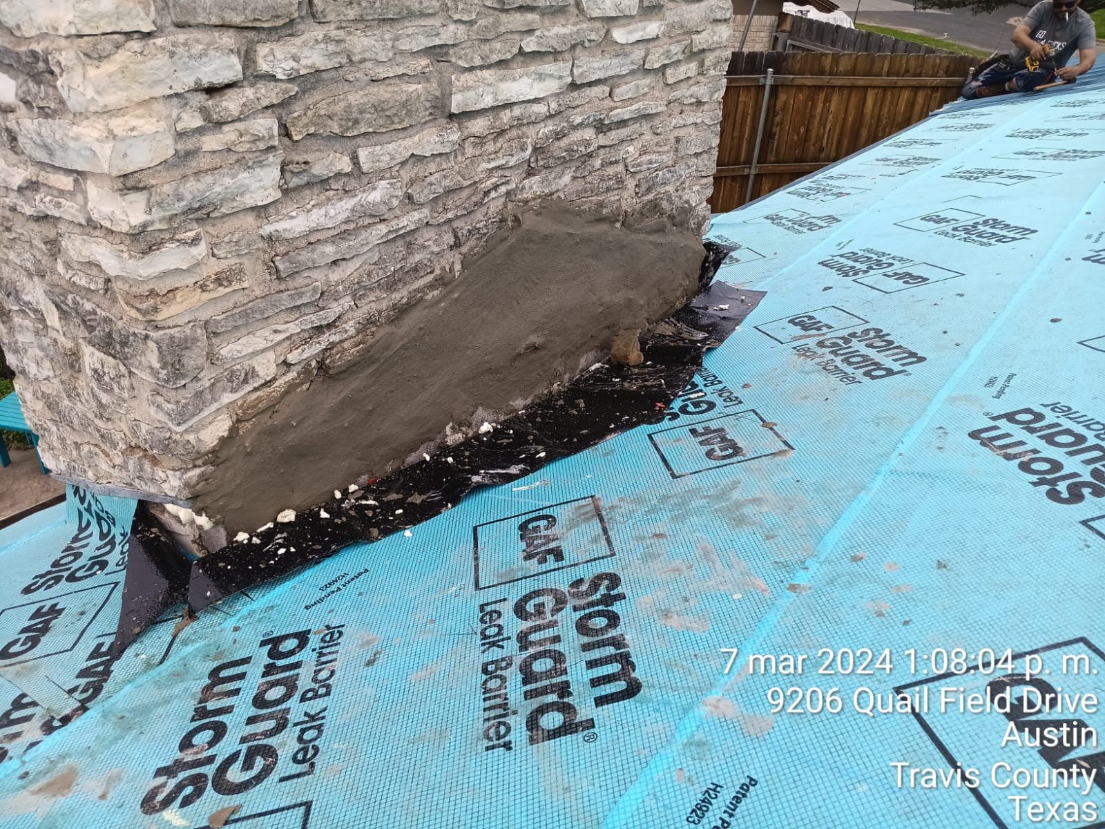 Underlayment and decking at a chimney base, Gold Coast Roofing and Solar