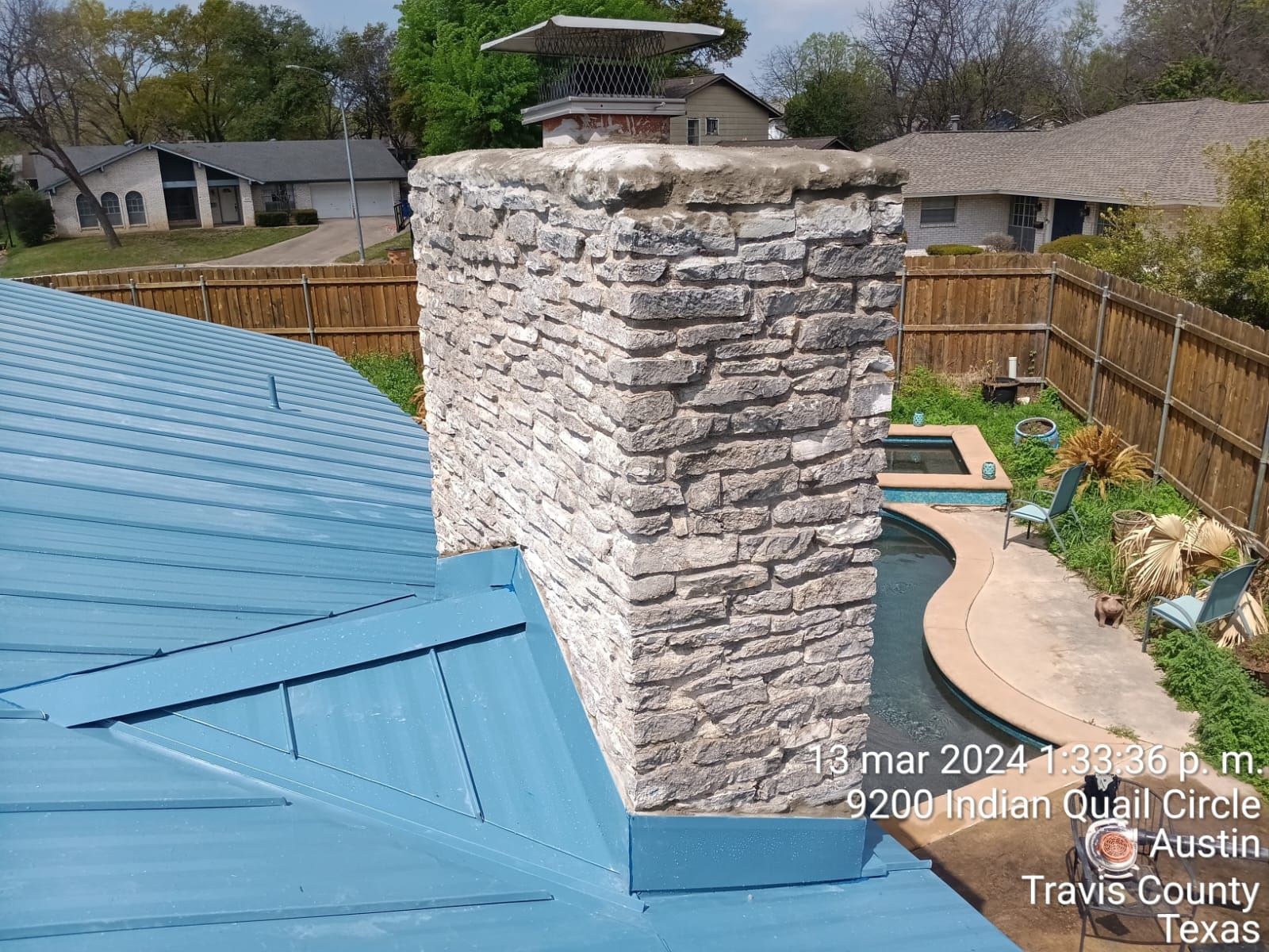 Stone chimney during roof repairs, Gold Coast Roofing and Solar